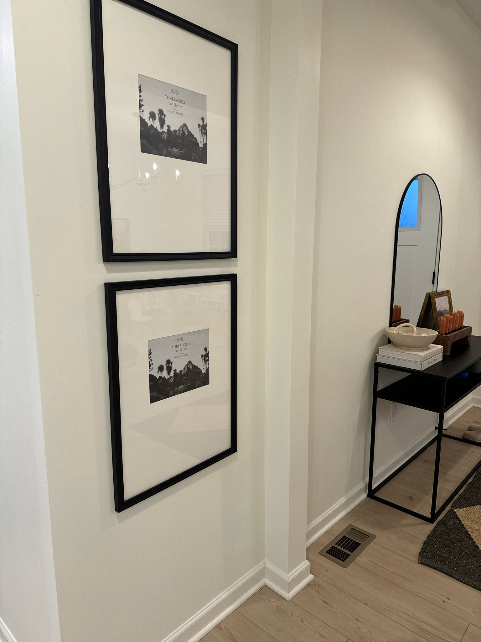 Gallery wall, entryway, arched mirror, decor books, accent, console table, black metal, rug, diamond, bowl, frame. Decor.

#LTKhome #LTKSpringSale #LTKfindsunder50