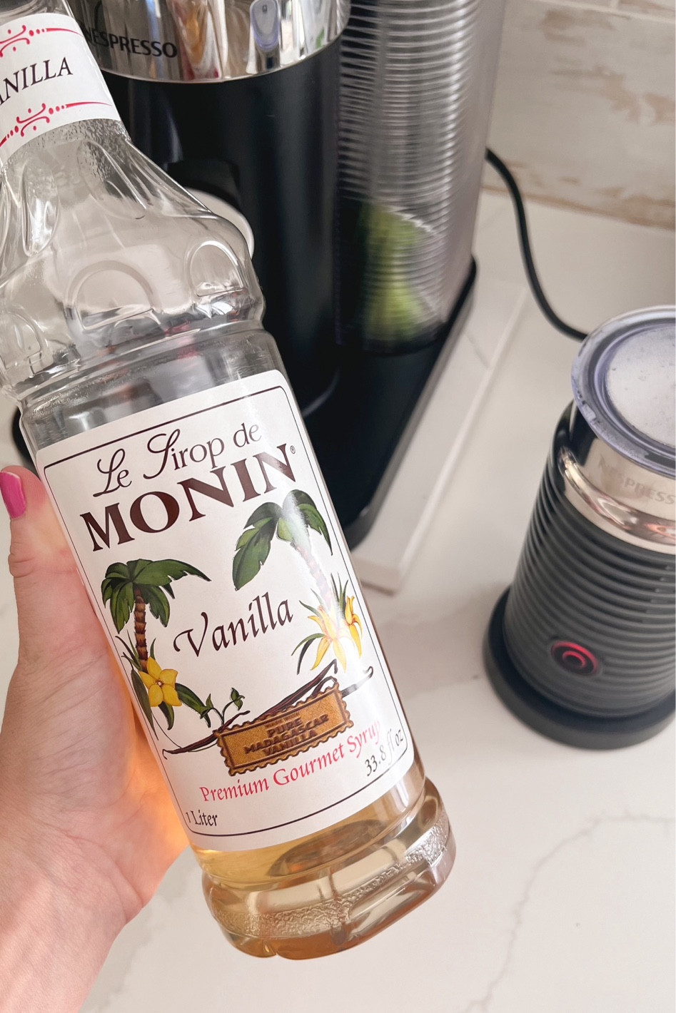 The Nespresso is our favorite coffee maker to date and the Monin Vanilla syrup takes it all to the next level ☕️

#LTKHome