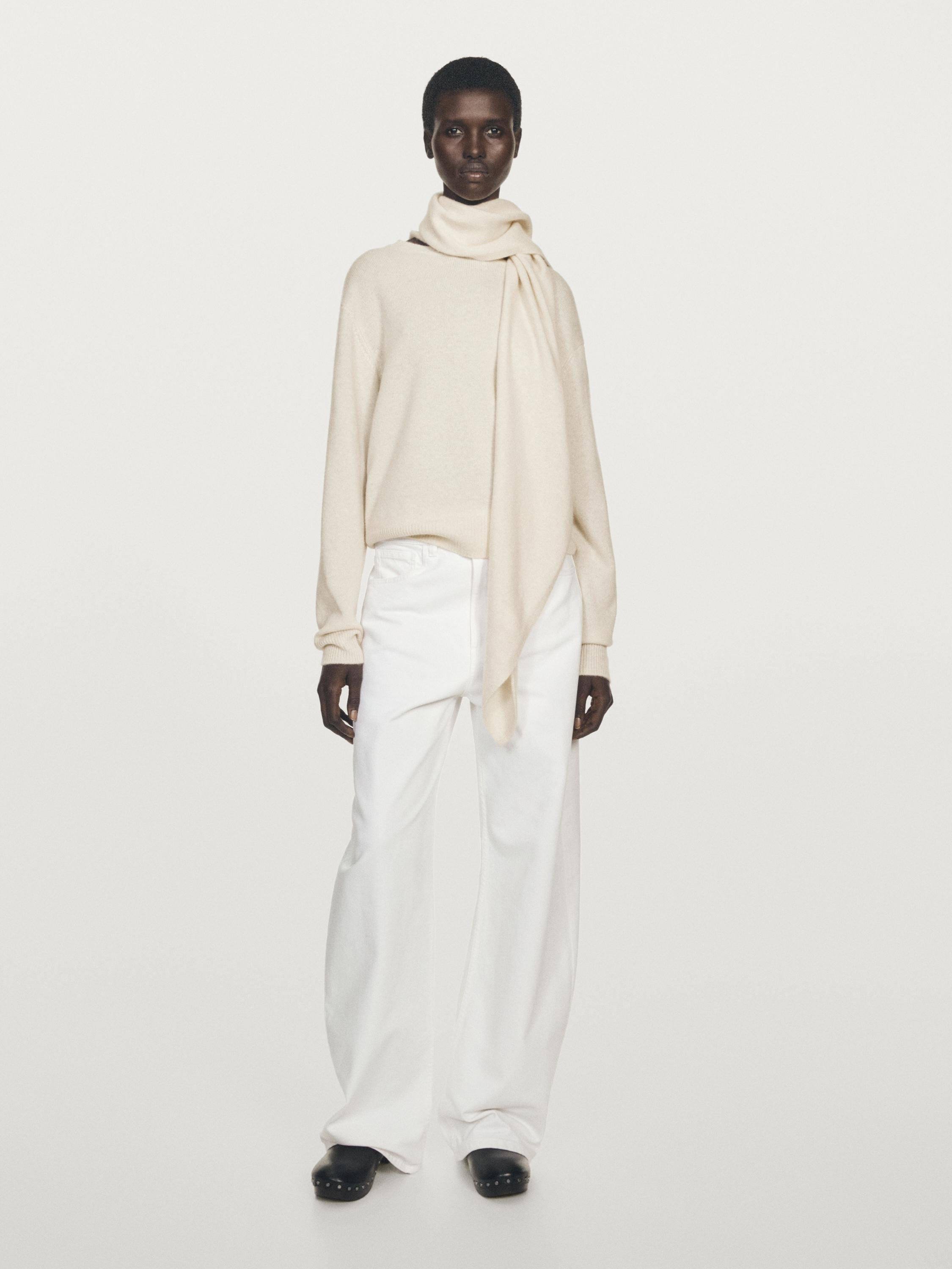 Sweater made of 100% cashmere. Long sleeves. Collar with multiway shawl-style tie detail. Soft fa... | Massimo Dutti UK