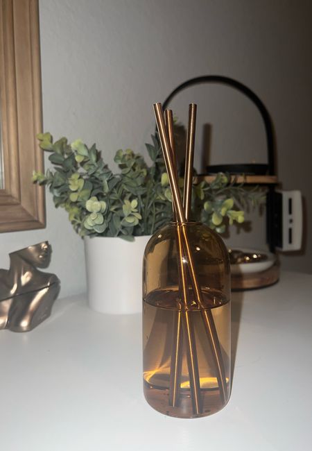 This everlasting candle is smoke-less, scent-less, and honestly just gorgeous. Golden hour vase with Champagne candlesticks 