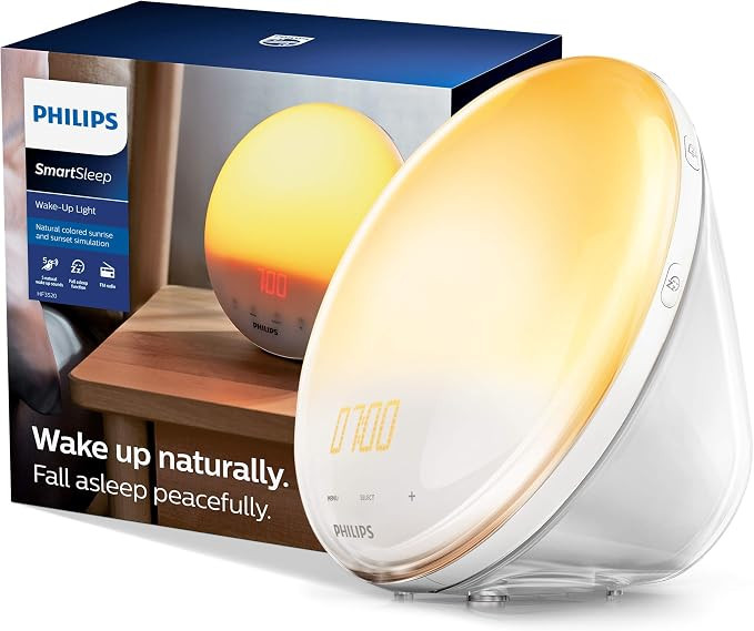Philips SmartSleep Wake-up Light, Colored Sunrise and Sunset Simulation, 5 Natural Sounds, FM Rad... | Amazon (US)