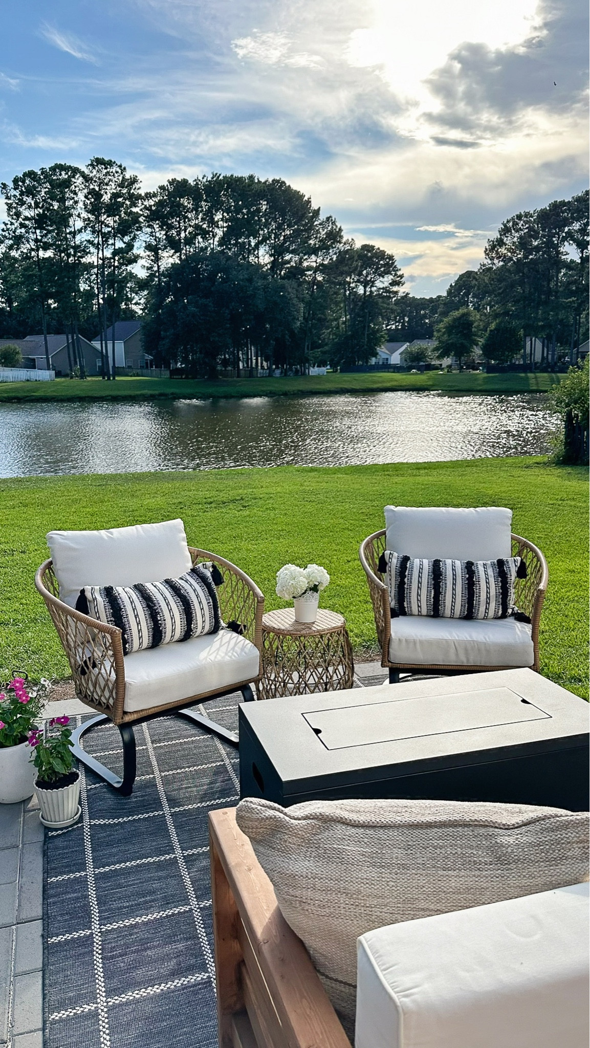 Outdoor living space with outdoor furniture and decor from Walmart, smokeless fire pit, wicker outdoor chair and table set, throw pillows

#LTKSaleAlert #LTKSeasonal #LTKHome