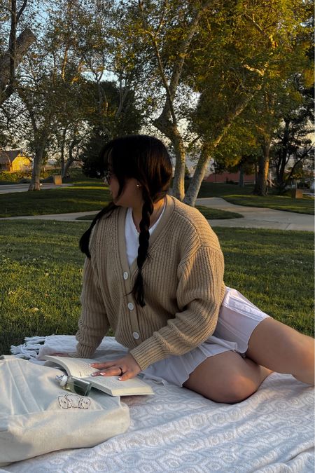 Spring sunset outfit. Darling cardigan. Aritzia tennis skirt. Sezane white tee

#LTKstyletip #LTKfindsunder100