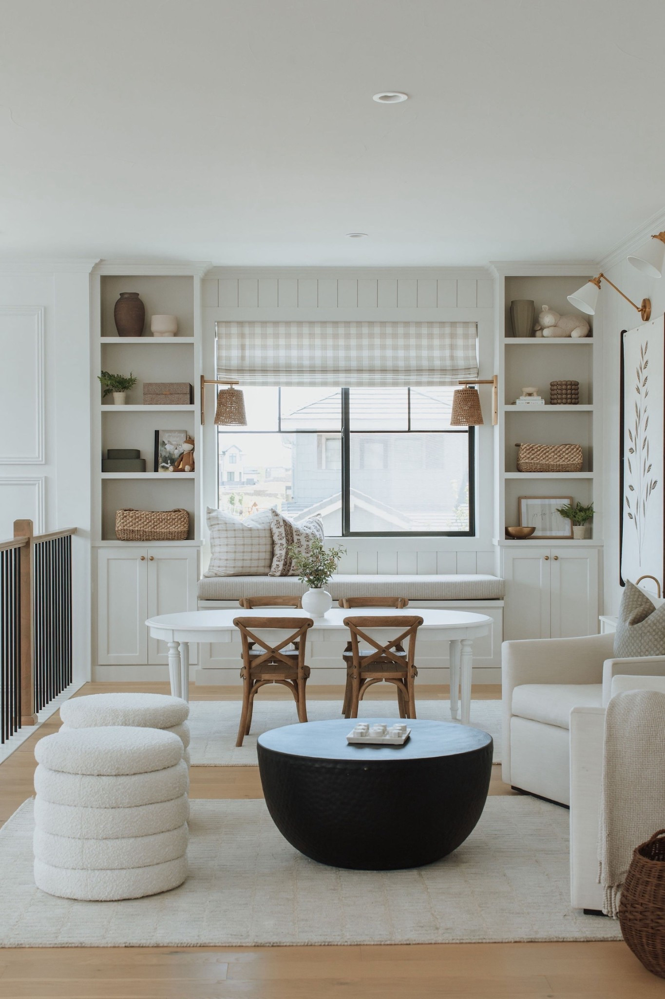 This loft space turned out so sweet. We adore the cute little kids table and chairs for an afternoon of crafting. The cozy seating area is perfect to snuggle up and play games as a family. 

#LTKFamily #LTKHome