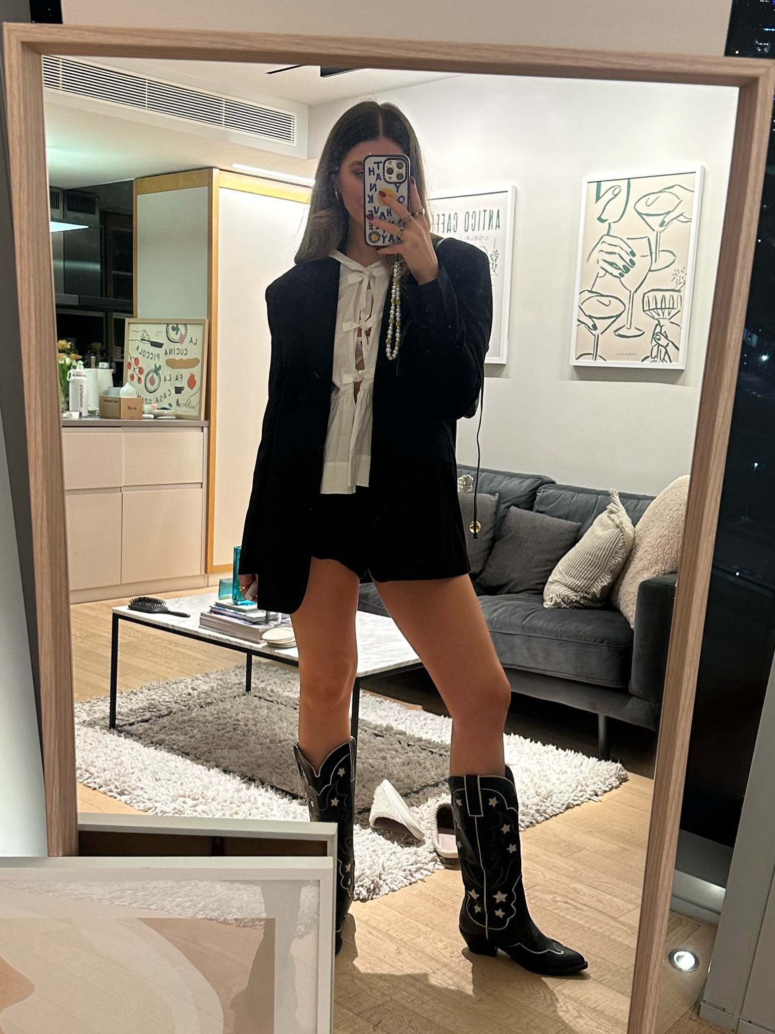 Black blazer, white ganni shirt, black shorts, black cowboy boots 

#LTKshoecrush #LTKstyletip #LTKMostLoved