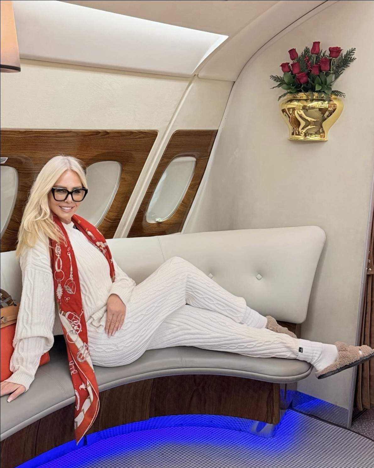 My travel go to outfit 

Scarf - Hermes
Tracksuit - Alo 
Slides - Hermes 