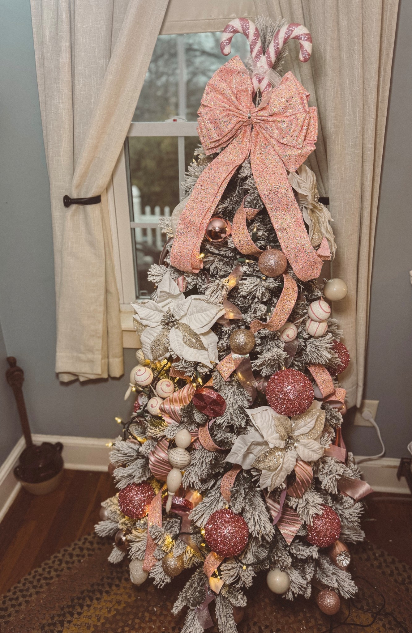 I'm not sure why, but it seemed like our guest room really needed its own tree this year.
Pink & white for this one with just the right amount of sparkle added in.

Christmas, Christmas decor, tree ideas, Christmas tree

#LTKHome #LTKHoliday #LTKSeasonal
