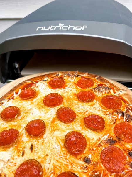 This @nutrichef_kitchen Portable Outdoor Pizza Oven makes a great gift for dad this Father’s Day. Also a fun wedding registry gift or housewarming gift. It’s a great way to entertain guests. The gift of unlimited pizza 🍕 

#LTKGiftGuide #LTKHome