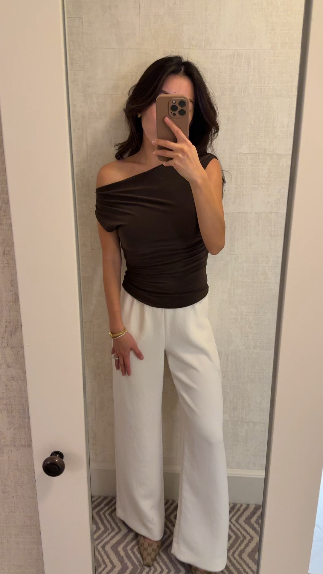 Aritzia sale! Chic double layered stretchy top that looks great with jeans or pants like this 

• XXs top stretchy, wearing regular bra with one strap tucked in 

• XXs short pull on lodge pants .  Drapey and elegant , easy to dress up or down. These work great on me with a kitten heel but I also own a few colors in regular length and hemmed 

#LTKootd #LTKPetite #LTKFindsUnder50