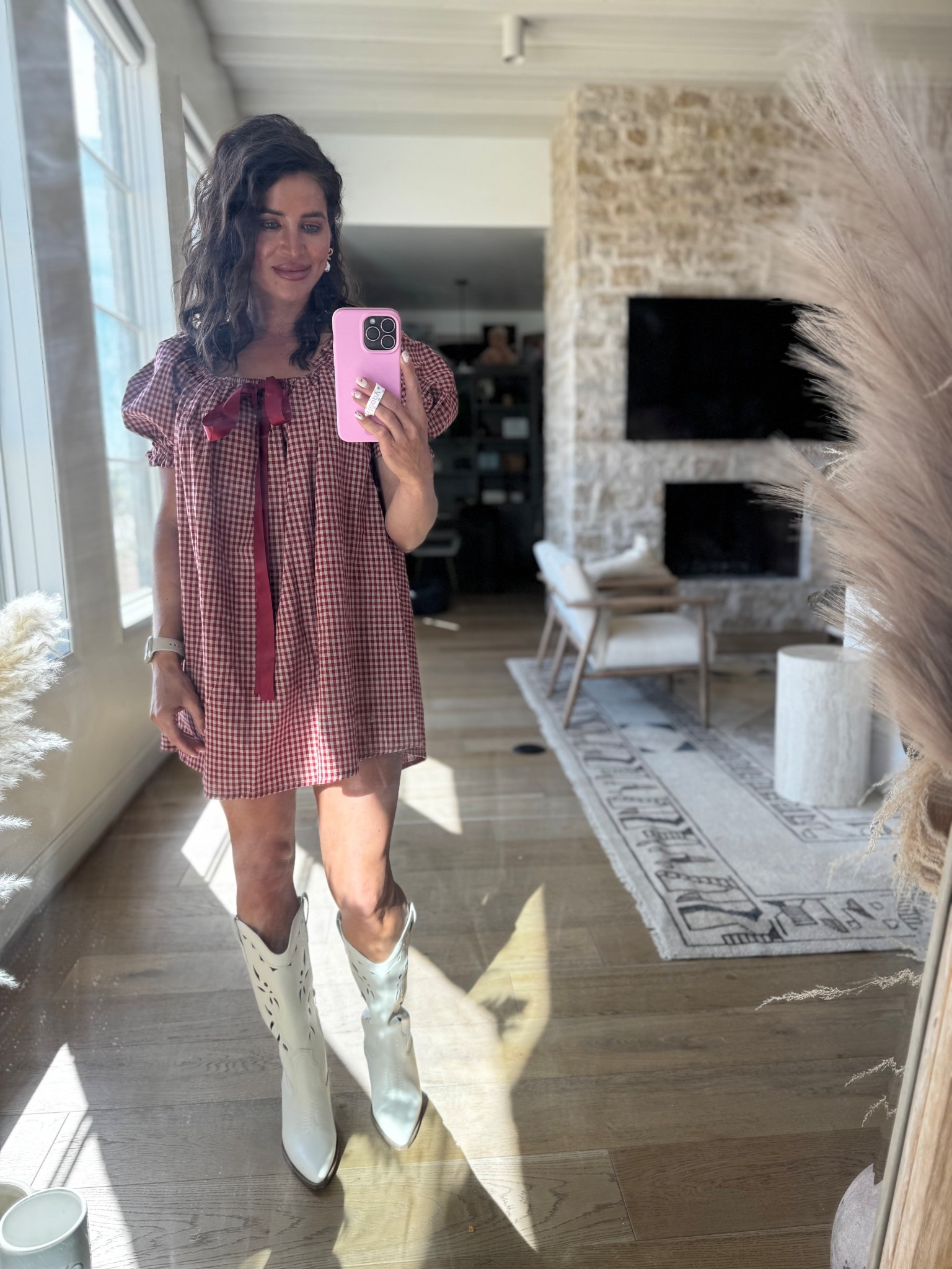 She’s cute. She’s comfy. She looks like she has her life together (she does not, but the outfit helps).

This gingham babydoll dress is giving picnic-core meets main character energy, and obviously I had to throw on the white boots to fully commit to the plot.

#LTKootd