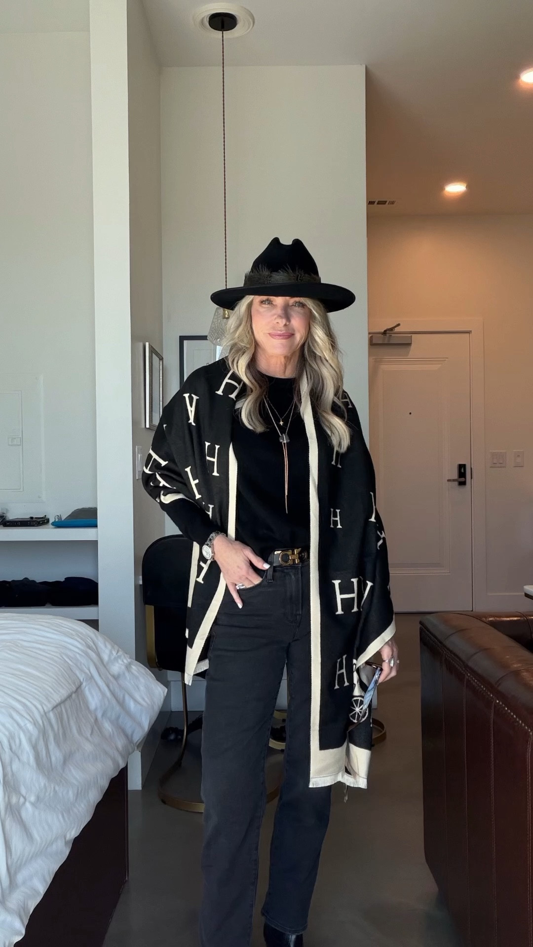 An all-black outfit never fails.

Black denim, a fitted sweater, boots, a statement wrap, and a hat for an Austin event. Simple, timeless, and effortless.

#LTKgrwm #LTKOver40 #LTKFestival