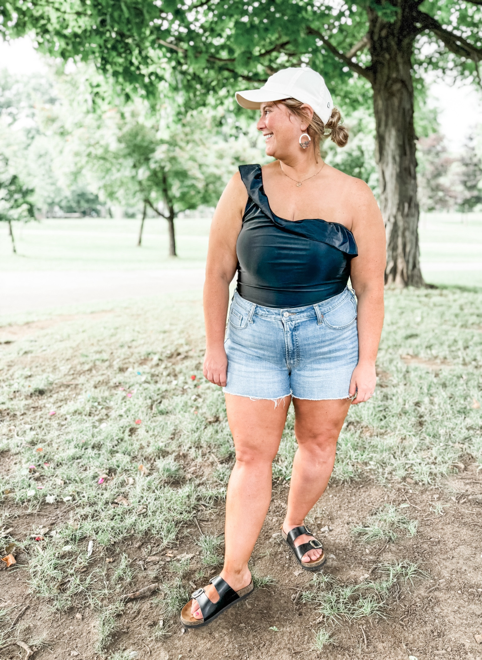 One shoulder swimsuit - wearing an XL but should have done a large - slight bit of extra fabric in bust
 
Jean shorts - 16 (sized up one)
Sandals - regular size 6.

Hat is from TJ Maxx so not linkable but linked similar 

#LTKSwim #LTKSeasonal #LTKMidsize