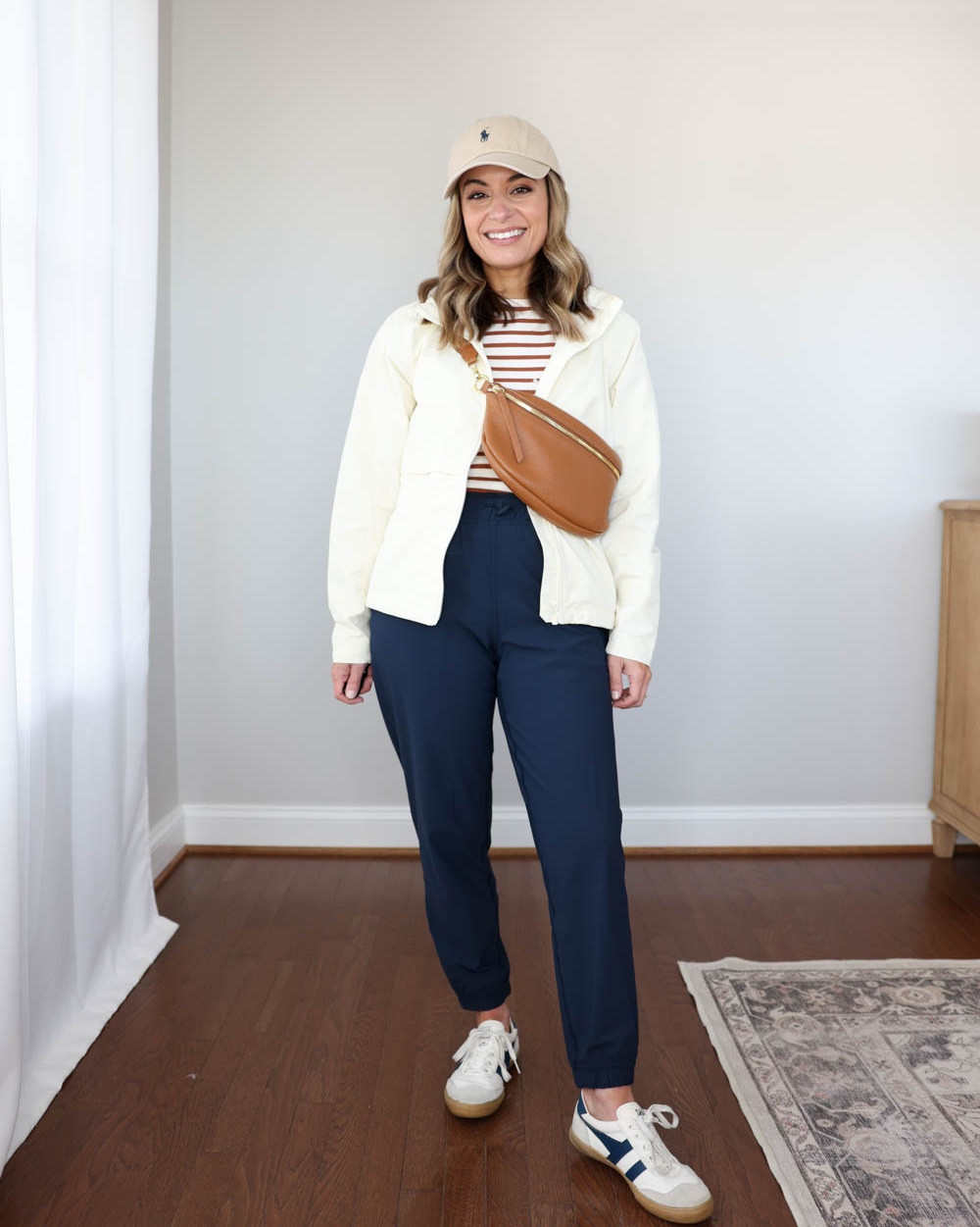 One of my favorite windbreaker jackets is back in stock for the fall season! 

It’s a lightweight water resistant jacket with a stand collar (very on trend this season). It has a hood that tucks into the collar. 

I’m wearing xs it fits me well even sleeve length. 

Outfits 
Joggers: petite xxs
Wide leg pants: xxs short 
White t shirt: petite xs

#LTKPetite