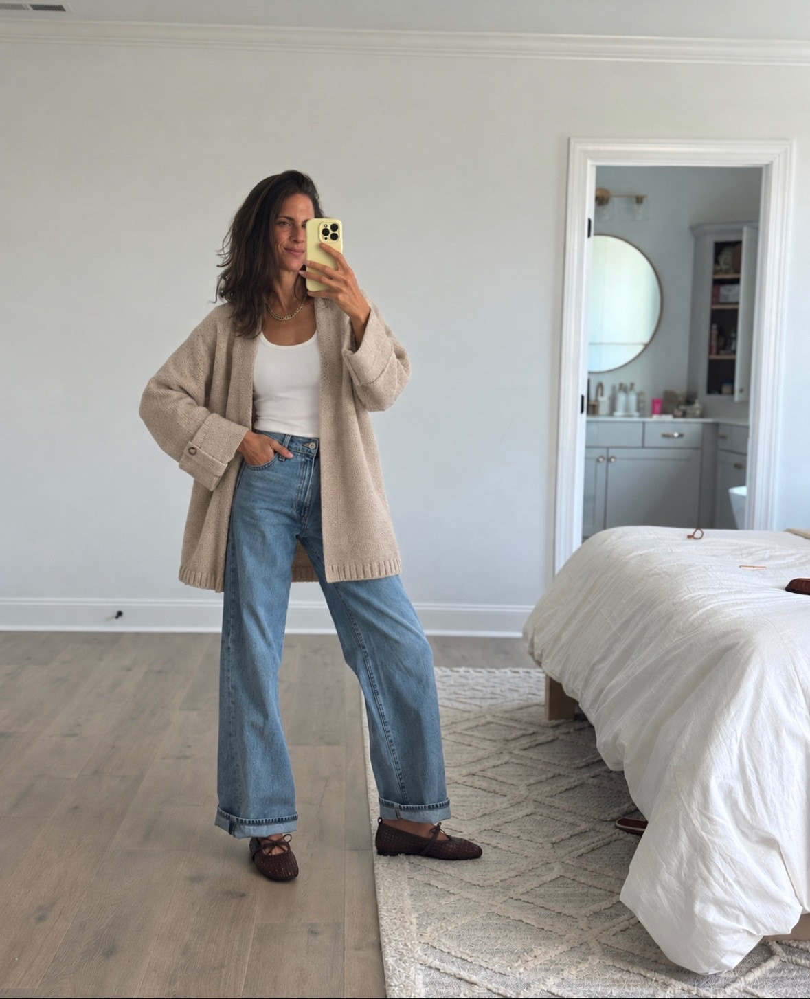 Easy fall outfit formula 🍂 A cozy oversized cardigan, white tank, relaxed cuffed denim + brown flats. Simple, comfortable, and so easy to recreate with pieces you’ll wear all season. 🤎 #falloutfit #casualfallstyle #fallfashion #LTKstyle

#LTKSeasonal #LTKootd #LTKmomlife