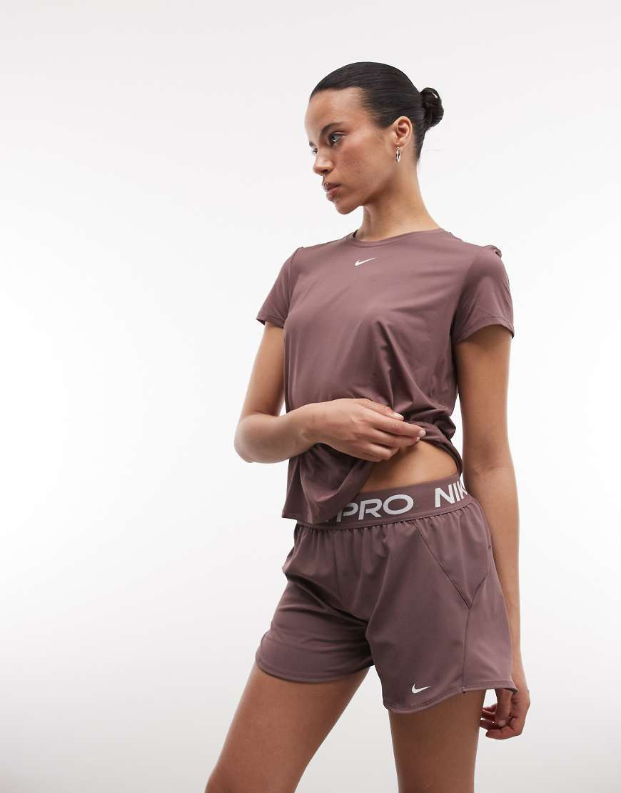 Nike Pro Training 2 in 1 shorts in brown | ASOS (Global)