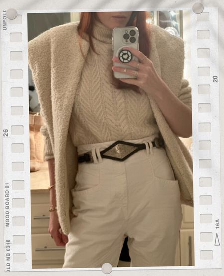 This outfit is make up of some of my best Isabel Marant finds. 
I love these high rise cream pants from Marant- they are flattering, unique and ON SALE! 
My vest is seasons old but she keeps producing it and it is warm, has pockets and is now a staple. It’s a cool kid look in a great French way. 
My belt is old Ralph Lauren but I couldn’t find anything like it online for you. 


#LTKSale #LTKworkwear #LTKtravel