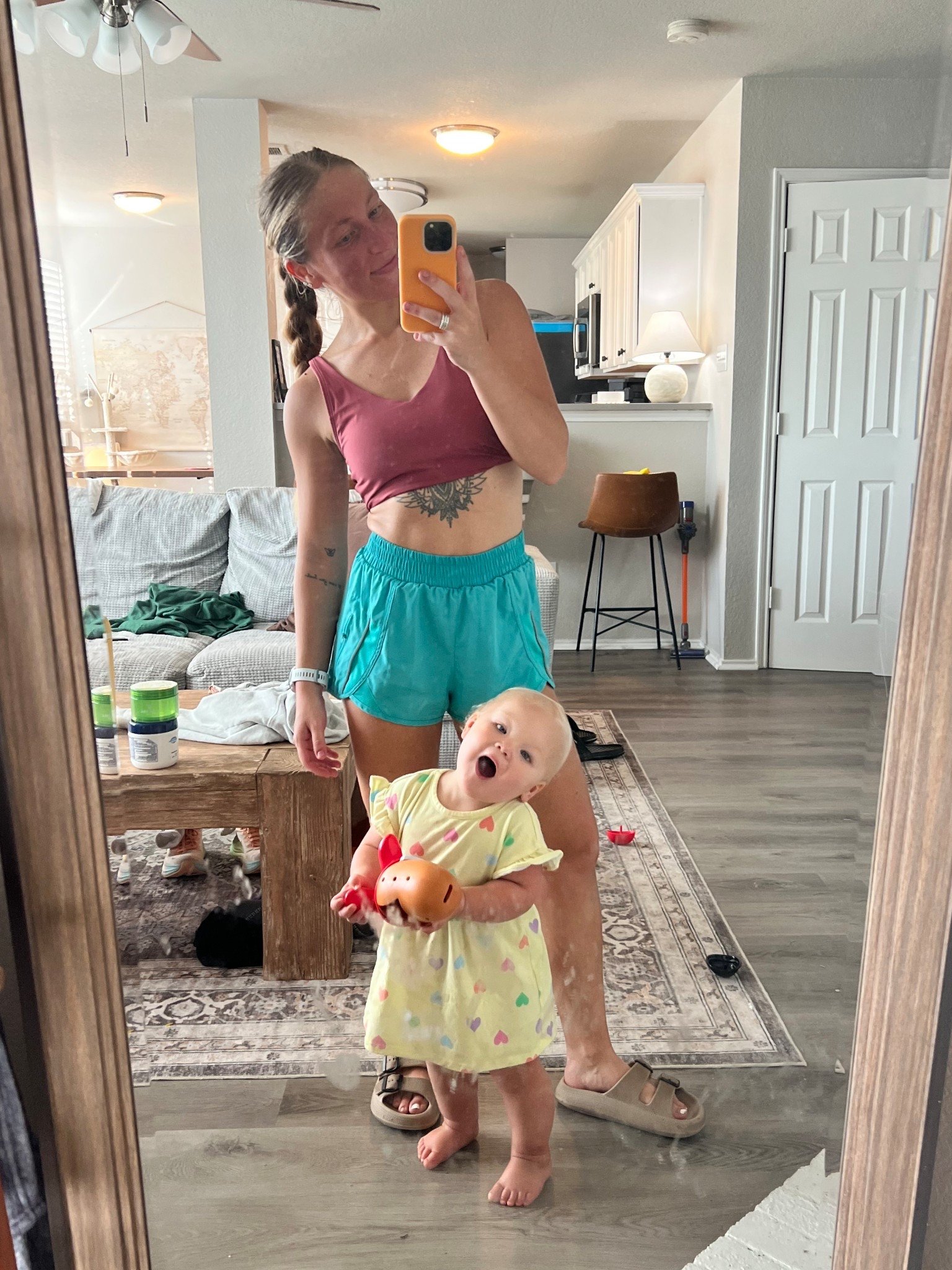 Today’s running fit 🏃‍♀️✨
I kept it simple, affordable, and so comfortable. This Amazon padded cropped tank top is double-lined and supportive enough to run in without a sports bra. Paired it with my go-to Amazon running shorts (soft, stretchy, and don’t ride up), no-show Amazon running socks, and the most comfortable Amazon sandals I throw on post-run.

Wearing my Garmin watch for tracking and this durable clear Amazon phone case that’s toddler-proof and run-tested ✅

Perfect for hot girl walks, runs, or errands with a toddler in tow. Everything is linked below! 💛
#AmazonFashion #RunningOutfit #MomRunner #LTKRun #LTKActivewear #HotGirlWalk #AmazonFinds #RunningEssentials #LTKUnder50 #LTKUnder100

#LTKActive #LTKStyleTip