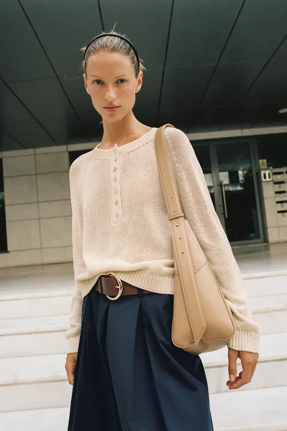 Long sleeve jumper with a round neckline. Front button fastening and ribbed trims. | Zara UK