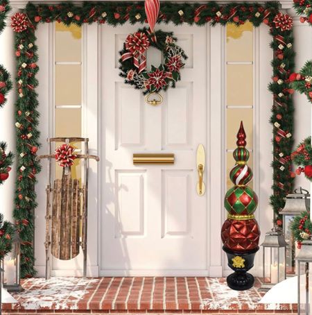 Christmas porch. Christmas topiary. Christmas porch decor. Statement Christmas decor. Christmas garland. #christmas #holidaydecor #holidayporch #christmasgarland

#LTKsalealert #LTKHoliday #LTKhome