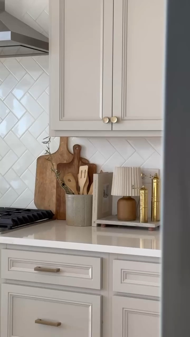 I wanted the counters to feel minimal but still warm and inviting. So I kept it simple, added a $10 lamp for a soft glow, and brought in a few earthy elements to make the space feel more intentional. 

#LTKFindsUnder50 #LTKFindsUnder100 #LTKHome