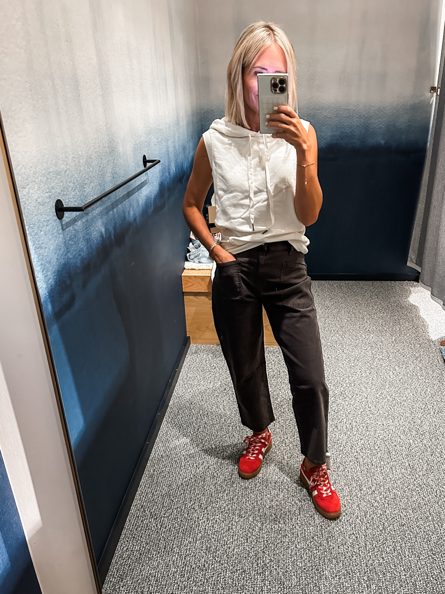 Barrel style pant - in my smaller size 24.  They have some stretch and a great feel to them. Color is like a charcoal

Sleeveless hoodie is cream and in my true size xs
Red sneakers- so cute- love the laces!

#LTKOver40 #LTKStyleTip #LTKShoeCrush