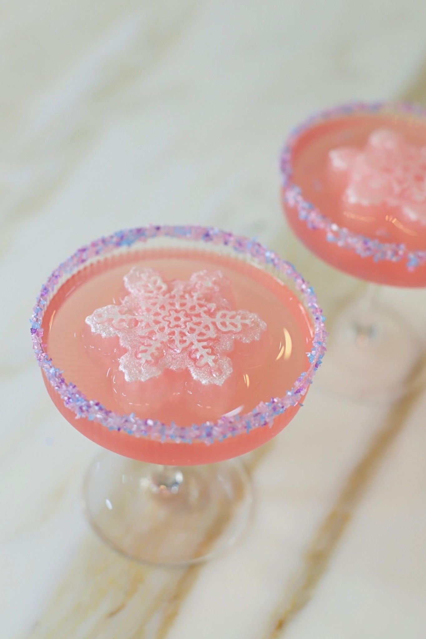For Stella's Winter ONEderland, we served the cutest Sugar Plum Fairy Punch using @drinkmilos Raspberry Lemonade.

We added edible glitter, rimmed the glasses with sparkly sugar, and even froze some into snowflake ice molds to keep the punch cold without watering it down!

Comment "sugar plum" for every utensil we used + Milo's Raspberry Lemonade! #MilosMomentMakers 


#LTKHome #LTKfoodie #LTKHoliday