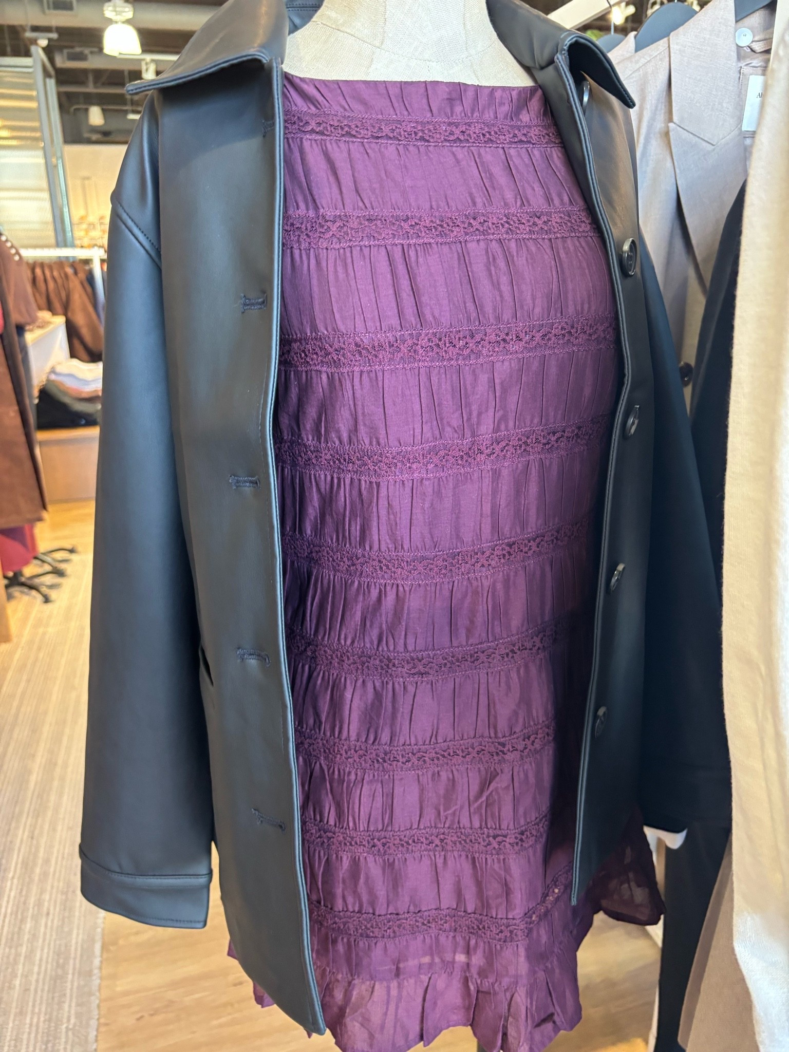 Shorter dress with vegan leather jacket 
On sale in the app!