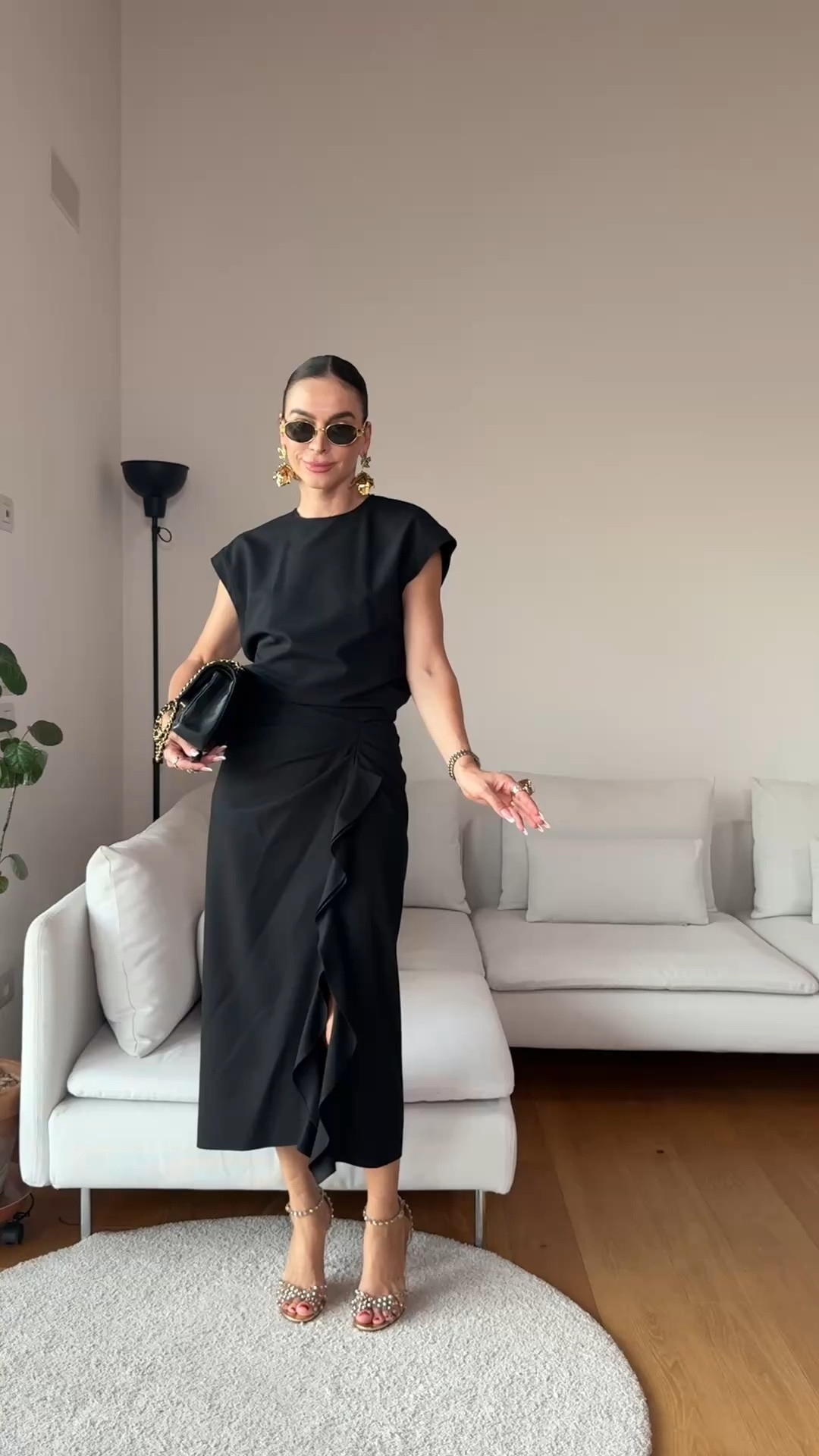 This Zara draped midi dress is the kind of piece that makes getting dressed so easy.

I’m 173 cm / 5’8” and wearing Size S. I usually wear EU 36 / UK 8 / US 4.

It has a round neckline, sleeveless cut, front draping and an asymmetric hem with a side slit. The back closes with a button.

I’m wearing Black, but it also comes in Ecru and Burgundy.

Black feels sleek and timeless. Ecru is softer and more minimal. Burgundy is such a beautiful fall option and feels instantly richer for evening.

Style it with heels and a small bag for dinner, or add sheer tights, knee-high boots and a long coat for fall. Pointed ballerinas work beautifully for daytime too.

Three colors, completely different moods.

🔎 Zara draped midi dress, Zara black dress, Zara ecru dress, Zara burgundy dress, burgundy midi dress, black midi dress, ecru midi dress, asymmetric dress, draped dress women, fall occasion dress, elegant midi dress, black dress with boots, burgundy fall outfit, dinner outfit women, date night dress, day to night dress, Zara new in, autumn dress outfit