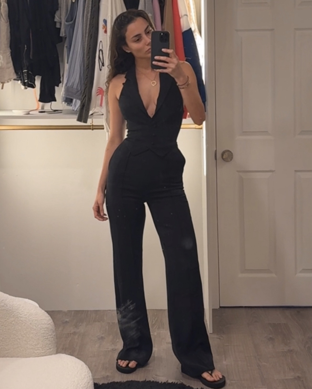 Wearing XS. It looks tight because it is. I think I am a true size S on this photo. 

100% polyester 

Black jumpsuit 

#LTKStyleTip