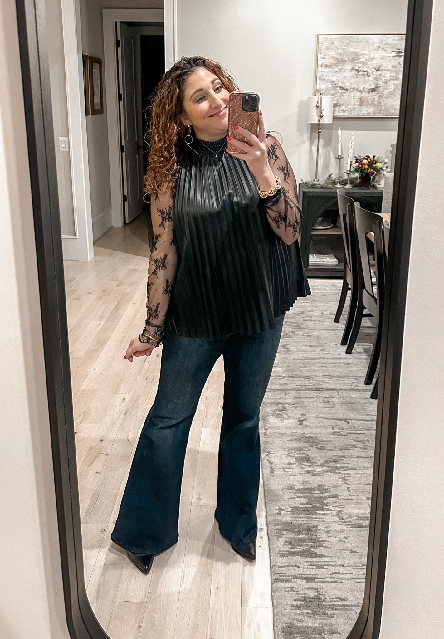 What I wore to a little steakhouse date night out with friends and spouses! Been wanting to wear this leather pleated top but it’s sleeveless SOOOO I layered it with this lace top! 
Lace top L / Pleated leather top (boutique find, will link similar) L / Flares 14 (tts) / booties (old, linking similar) tts

#LTKMidsize #LTKParties #LTKStyleTip