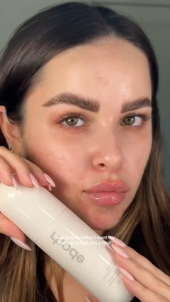 a glowy skin prep line up that never fails me ⭐️ @rhode skin glazing mist, @Bubble Skincare milky toner, @The Isle of Paradise sunny serum in champagne, @Typology Paris illuminator drops #skinprep #makeupprep #glowyskin #glowymakeup #makeuptutorial 