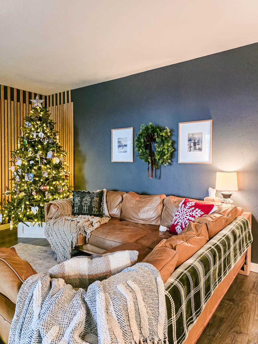 Easy holiday living room: Just the tree, the sofa, and a few Christmas pillows. Clean, simple, and so cozy. #christmas #livingroom 

 #LTKHoliday #LTKSeasonal #LTKFindsUnder100
