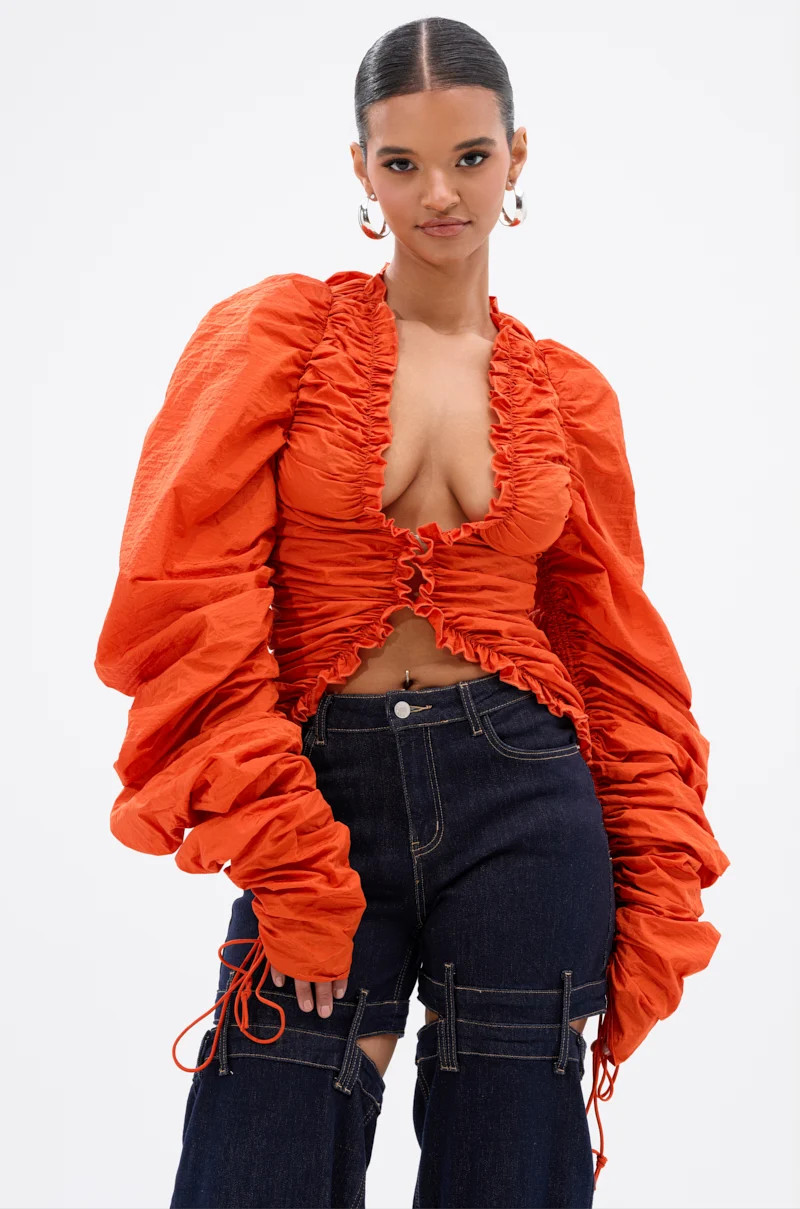 IN IT TO WIN IT RUCHED BLOUSE | AKIRA
