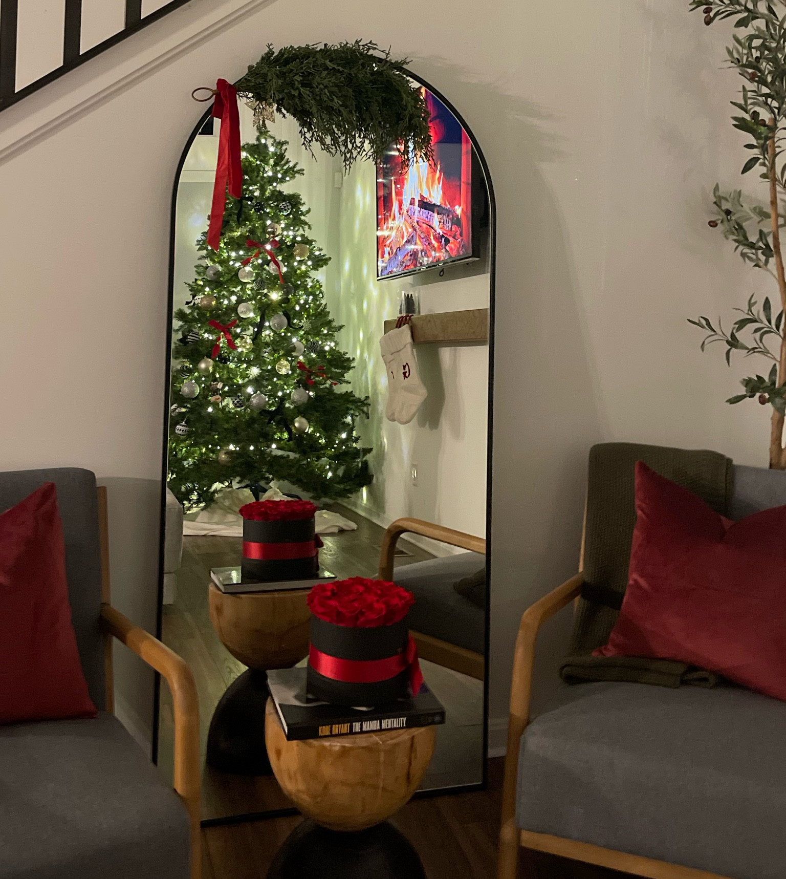 $13 faux greenery mirror decor is so cute!! It looks so real! 

#LTKfindsunder50 #LTKHoliday #LTKhome