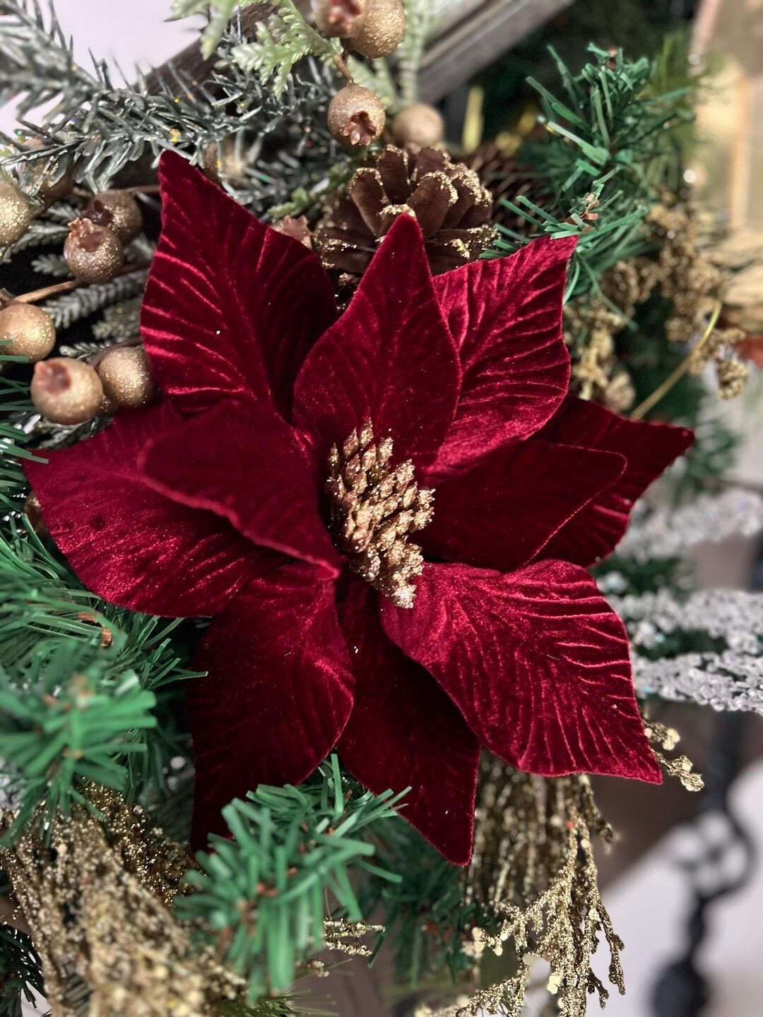 Give your holiday arrangements a luxe upgrade with this Burgundy Velvet Poinsettia Pick from onlinepartycenter. The rich velvet petals and gold glitter center create a beautiful, festive focal point, while the flexible design makes shaping and styling effortless. Perfect for wreaths, centerpieces, garlands, and DIY décor, this elegant pick brings warmth and sophistication to any holiday project. A simple way to add depth, texture, and sparkle to your seasonal crafting. ✨🎄
#LTKhome #holidaycrafts #poinsettiadecor #christmasDIY #velvetpoinsettia #holidayarrangements #etsyfinds #festivedecor

#LTKSeasonal #LTKHome #LTKHoliday