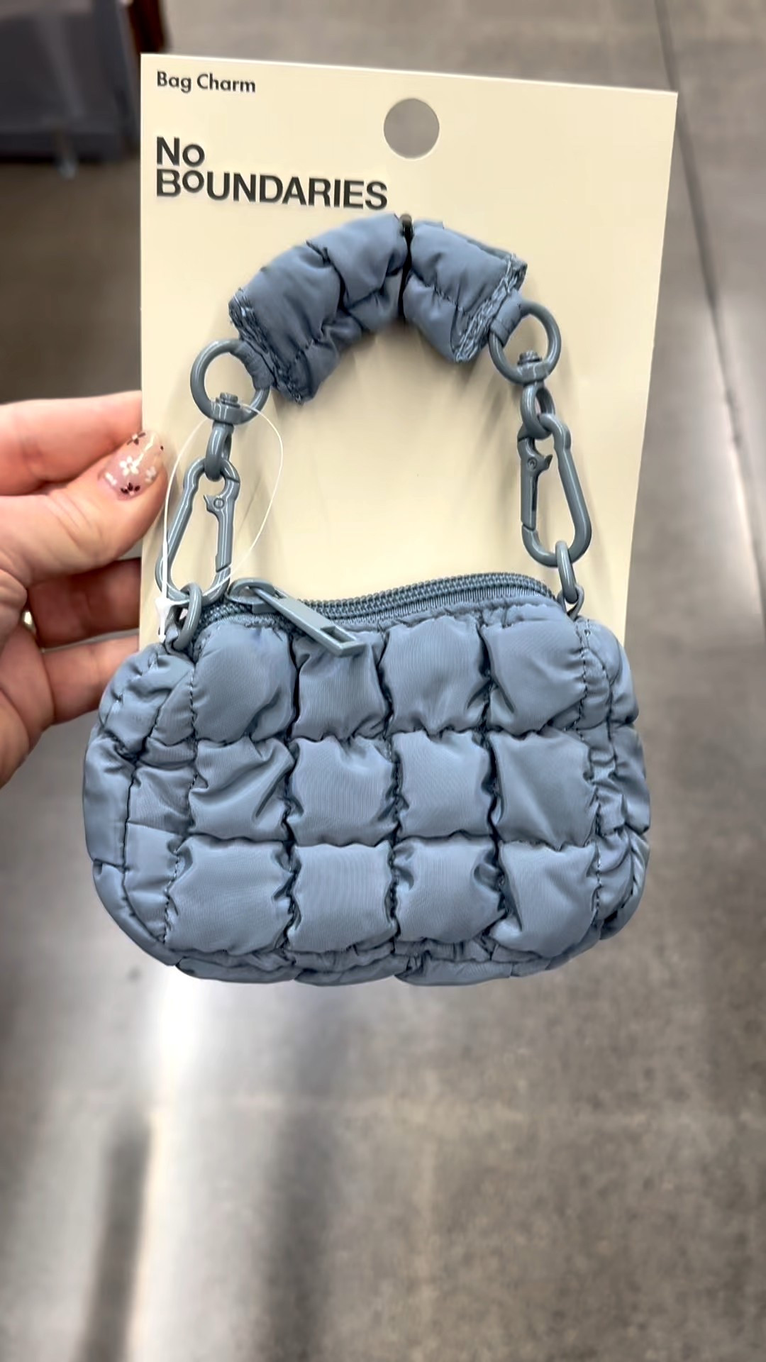 I found the cutest new bag charms today while shopping  The little blue puffer mini bag is a perfect dupe for a popular one three times the price ! I took home the bow charm and the mini tote charm. The mini bags would also be the perfect gift card holder and make the perfect gift. 