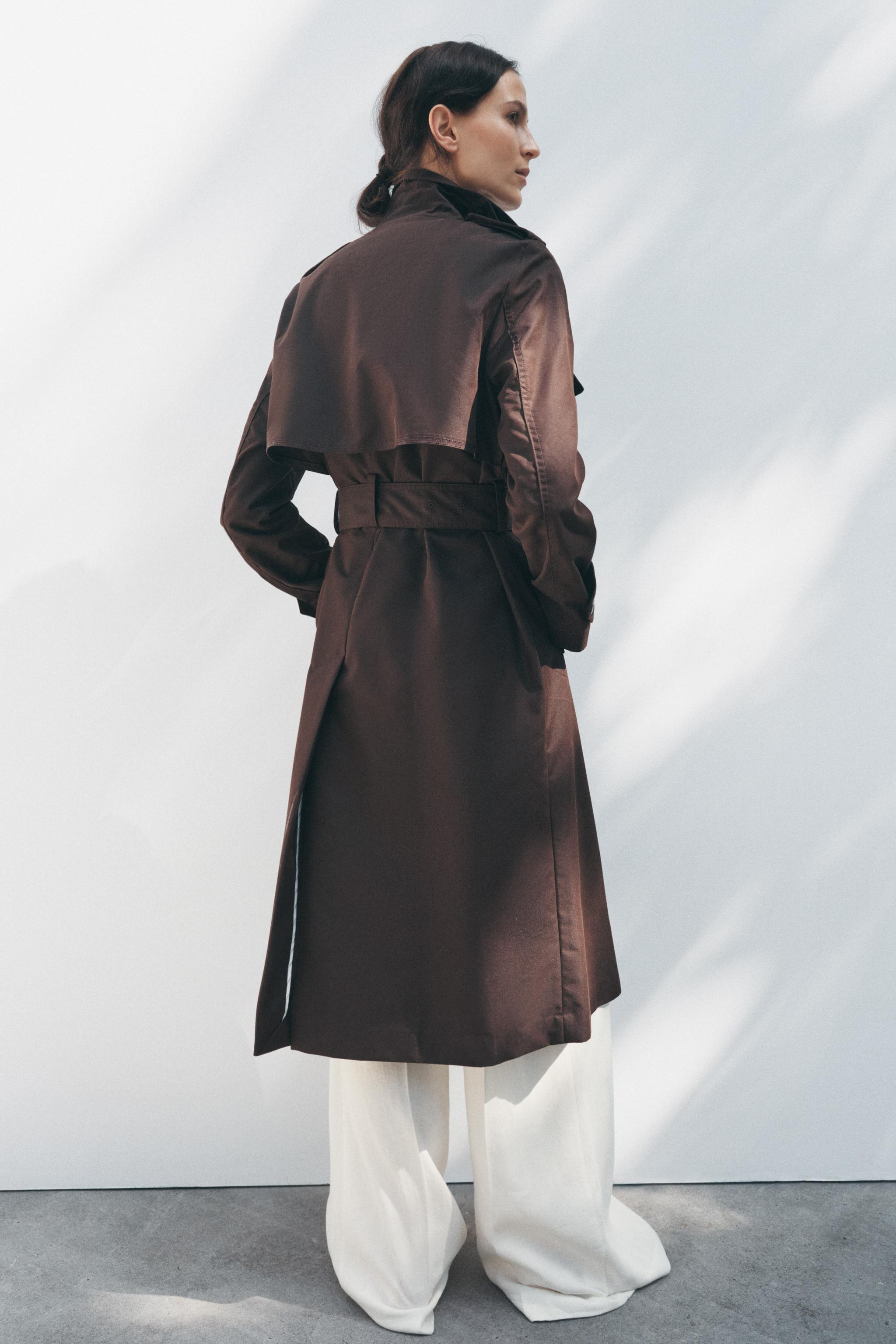 ZARA WOMAN COLLECTIONTrench coat made of cotton yarn. Lapel collar and long sleeves with adjustab... | Zara US