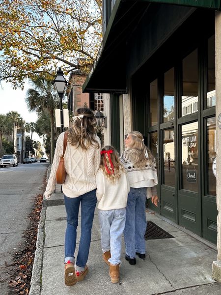 My daughter is wearing XS in the old navy top and sweater over her shoulders. 50% off sitewide for old navy. I am wearing a M in my amazon sweater, on sale today. 27L in the Abercrombie jeans. My boots are from DHgate and I can not tell the difference at all! They do come with the logo. My youngest is wearing a kids sweater from H&M, 30% off sitewide for cyber Monday. 

#LTKSeasonal #LTKHoliday #LTKsalealert