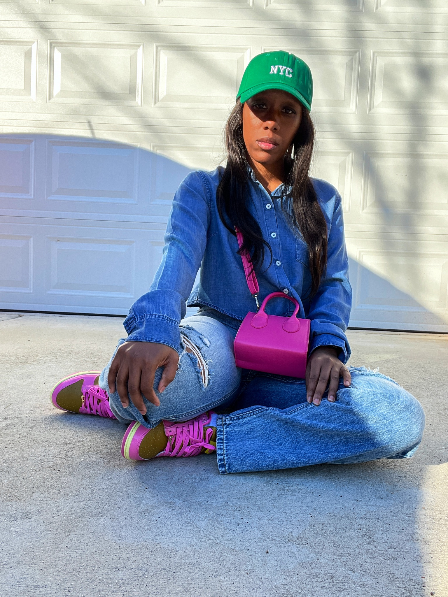 Denim on denim with a pop of color. I’m wearing a chambray shirt with denim distressed jeans, green hat, and pink purse

#LTKStyleTip #LTKShoeCrush #LTKFindsUnder100