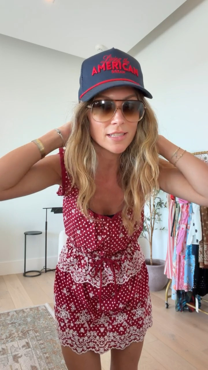 Today’s Memorial Day outfit!! 
Cutest Memorial Day/july 4th trucker hat 
Ray ban sunglasses are some of my favorites for summer! 

Everything I’m wearing is on sale!! 
Beach riot bikini 15% off 
Target top & skort is so cute for summer. Could wear together, separate, as a coverup or for a country concert!! 

I’ve been loving these croc flip flops!

#LTKootd #LTKSaleAlert #LTKOver40