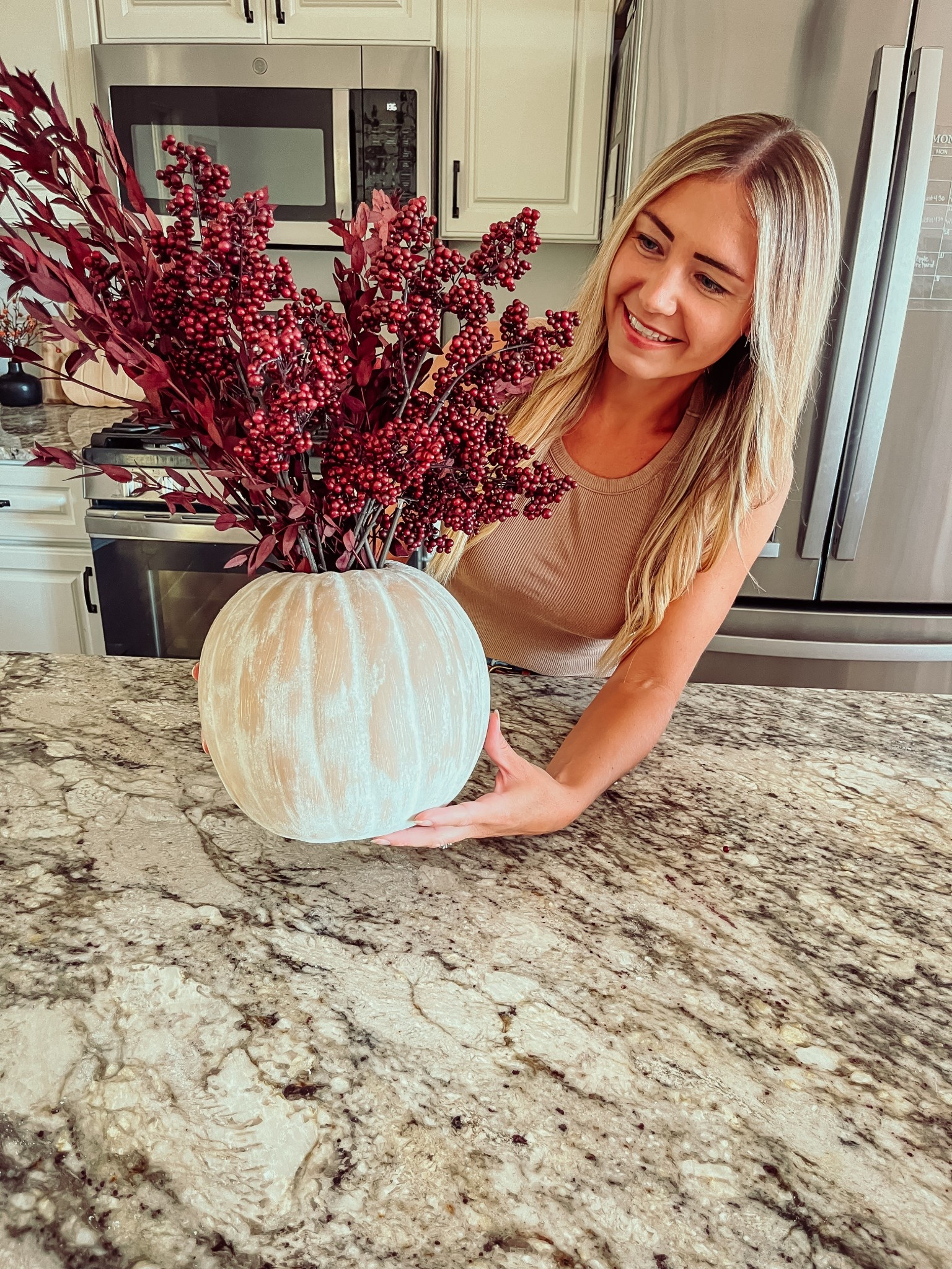 Easy DIY Fall centerpiece 🍁🍂

Paint any plastic pumpkin your desired color, and cover with either flour or baking soda before it's fully dry to give it a textured look. Wipe off any extra powder. 

Next cut out the top and fill with you favorite Fall florals! 

Fall centerpiece. DIY. LTK HOME. LTK seasonal. 

#LTKSeasonal #LTKHome