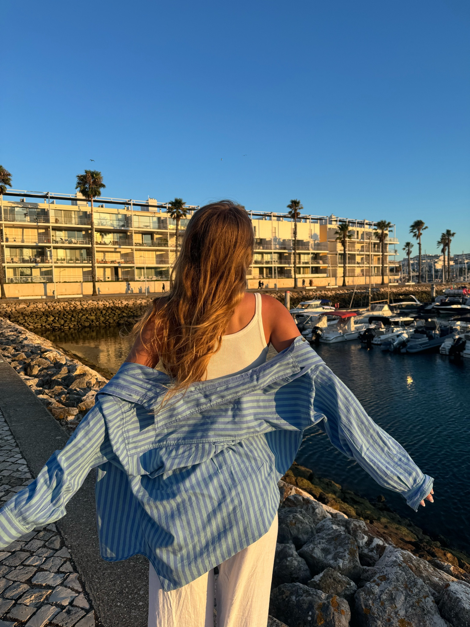 my staple shirt for fall/summer, such a good button down for layering or over a sweater #vintage #buttondowns #striped #freepeople #fallfashion

#LTKWorkwear #LTKFindsUnder100 #LTKTravel