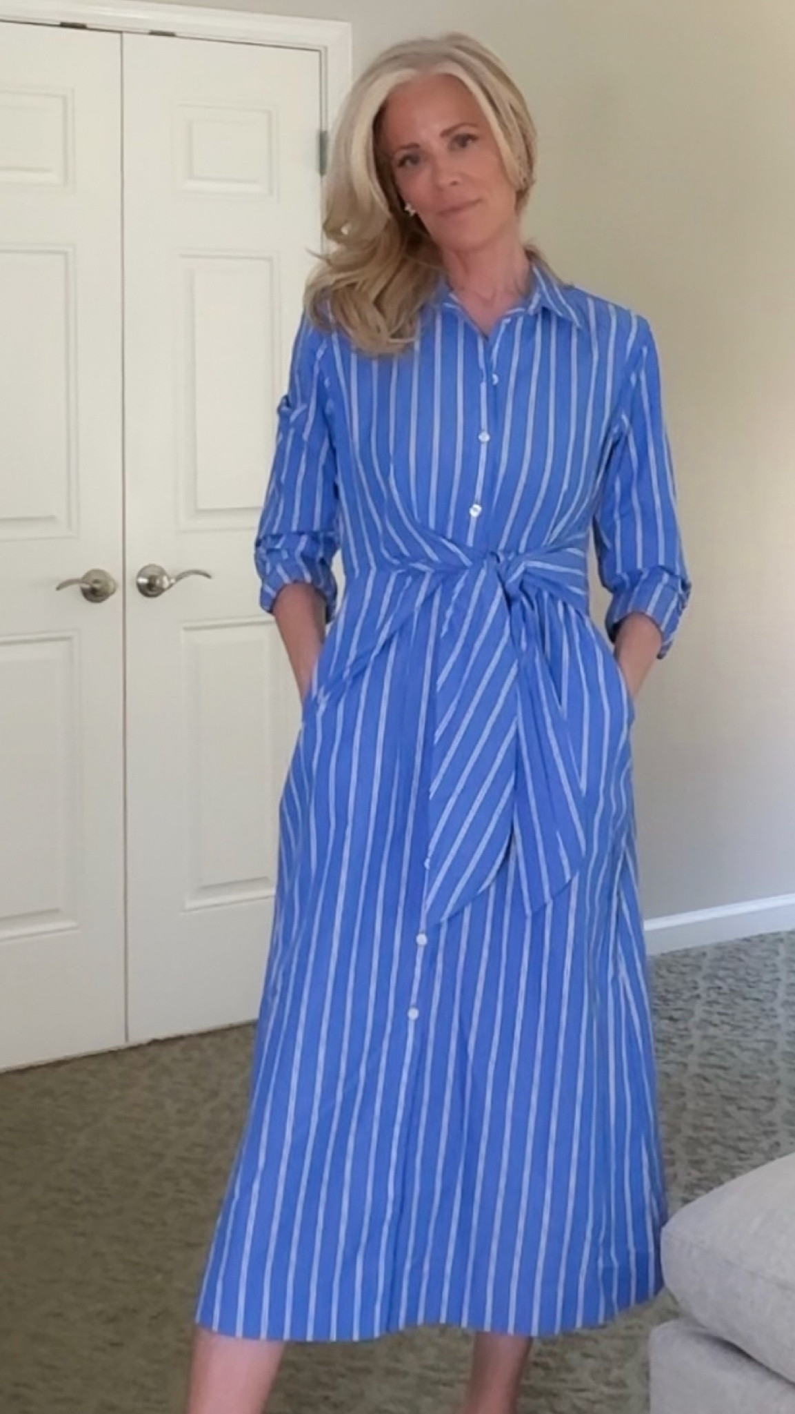 Classic 3/4 length dress. Blue with thin white stripes. Button down with tie waist. Collar and button up sleeves. Perfect spring dress for baby shower, lunch, shopping, vacation, casual lunch after shopping. Thin cotton feel. 

#LTKFindsUnder50 #LTKOver40