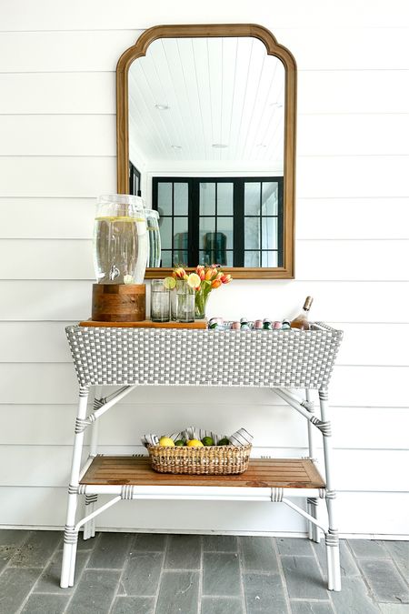 Sharing a simple outdoor entertaining setup using our barcart that has an amazing feature…you can pop off the two sections of wood on top to expose two ice buckets for keeping beverages cool!  It’s also currently 20% off with code SALE!

#LTKhome