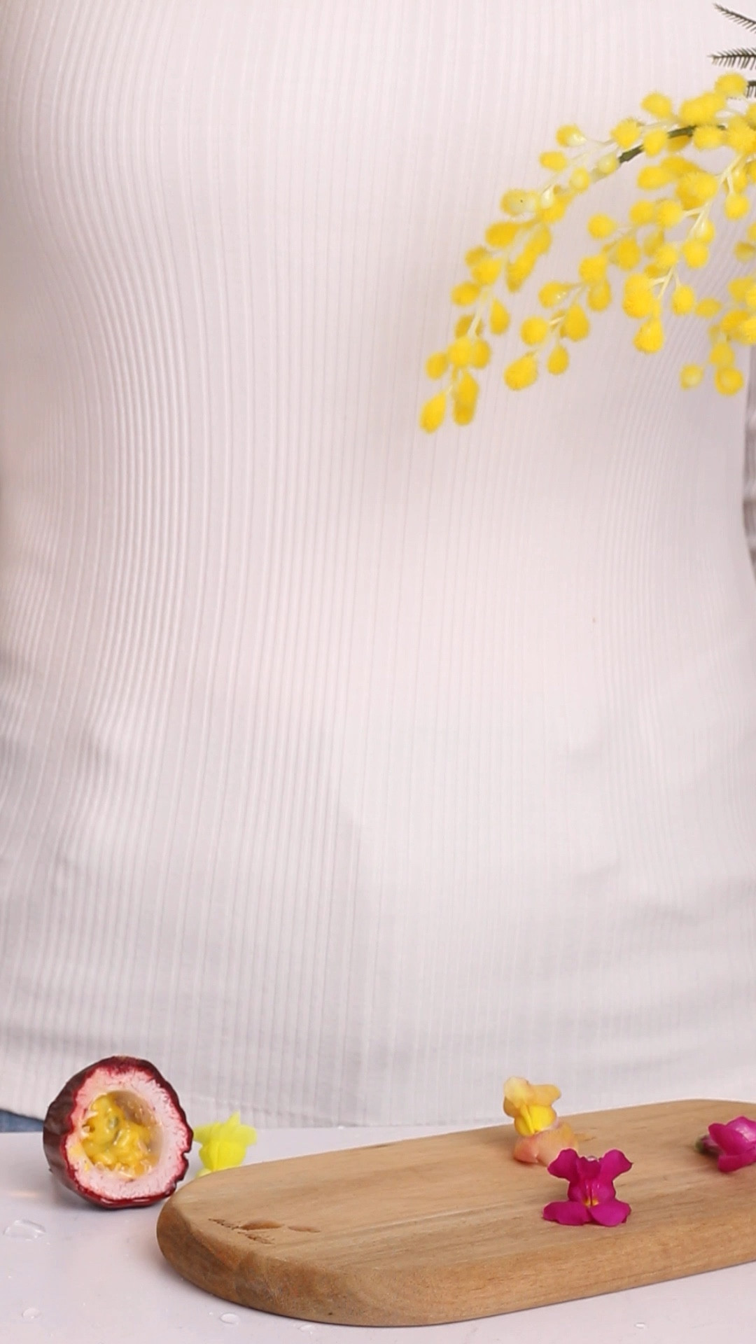 My 3 ingredient passionfruit spritz mocktail is the perfect alcohol-free drink for the warm weather, served in my favorite simple champagne glass. 