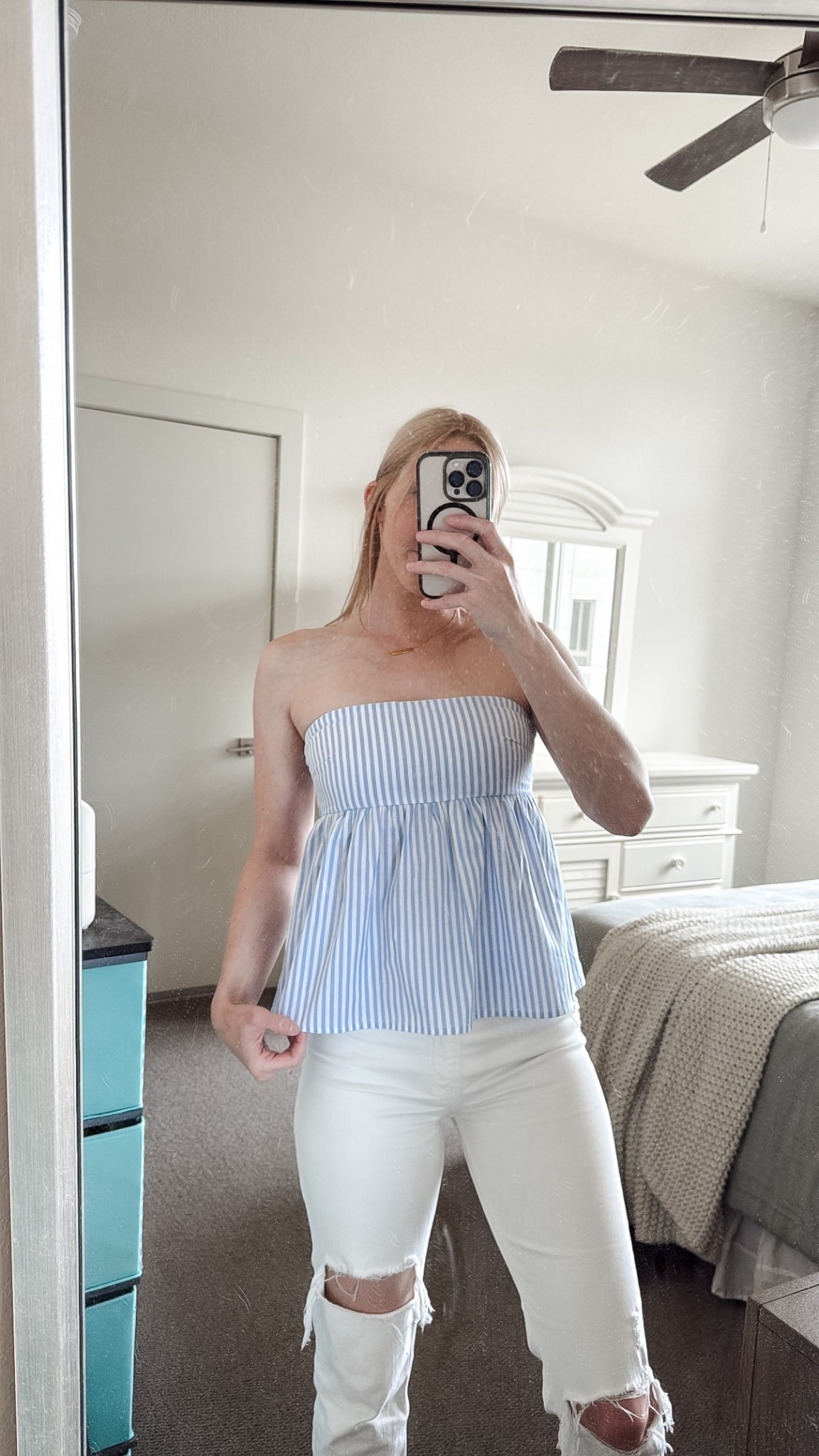 Favorites from Beginning Boutique! Love this cutie light blue striped strapless babydoll top ☺️

I paired it with my favorite white jeans here. I’m normally a size XS in tops, but this was my first time ordering from Beginning Boutique, so I ordered a US size 4. I should have ordered a 2, I feel like it would have fit more like an XS. With that in mind, the top is a little big on me, but you can tie it tighter in the back, so I’m definitely keeping it!

Cute spring tops, spring outfits 2026, strapless top, vacation outfit, spring style, spring outfit idea

#LTKootd #LTKgrwm #LTKSpringSale