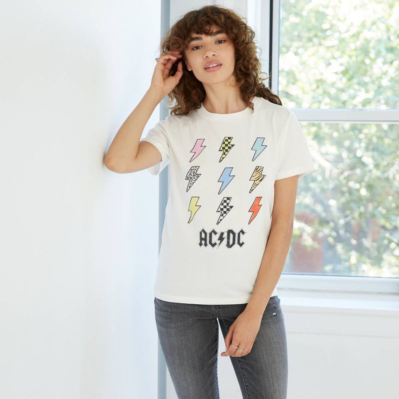 Women's AC/DC Lightning Bolt Boyfriend Short Sleeve Graphic T-Shirt - Cream | Target