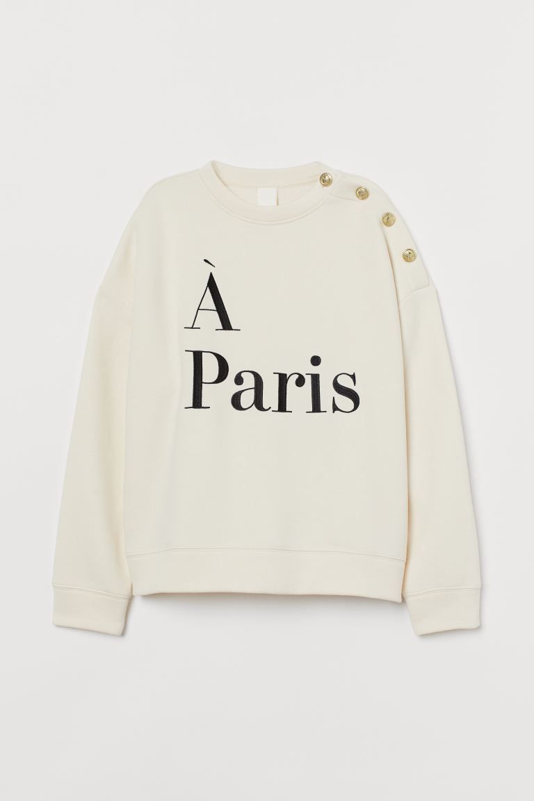 Soft sweatshirt with a text design at front. Dropped shoulders, long sleeves, and ribbing at neck... | H&M (US + CA)