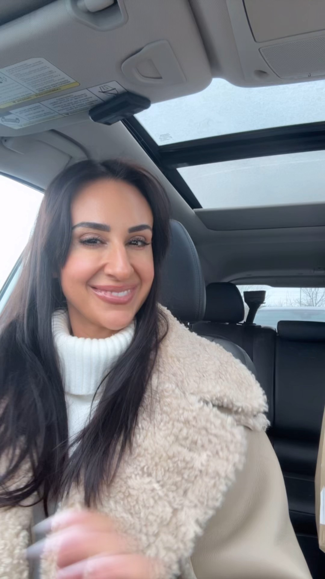 Tan Sherpa coat and chunky turtleneck 

#LTKwinter