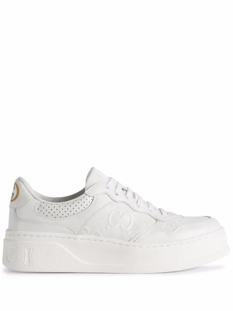 GG embossed low-top sneakers | Farfetch (US)